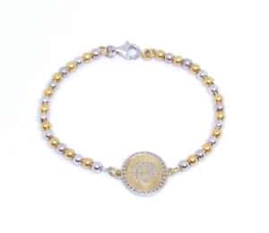 Bracciale Circe Bicolore in Argento con bassorilievo della Maga Circe e palline alternate in argento rodiato e dorato.