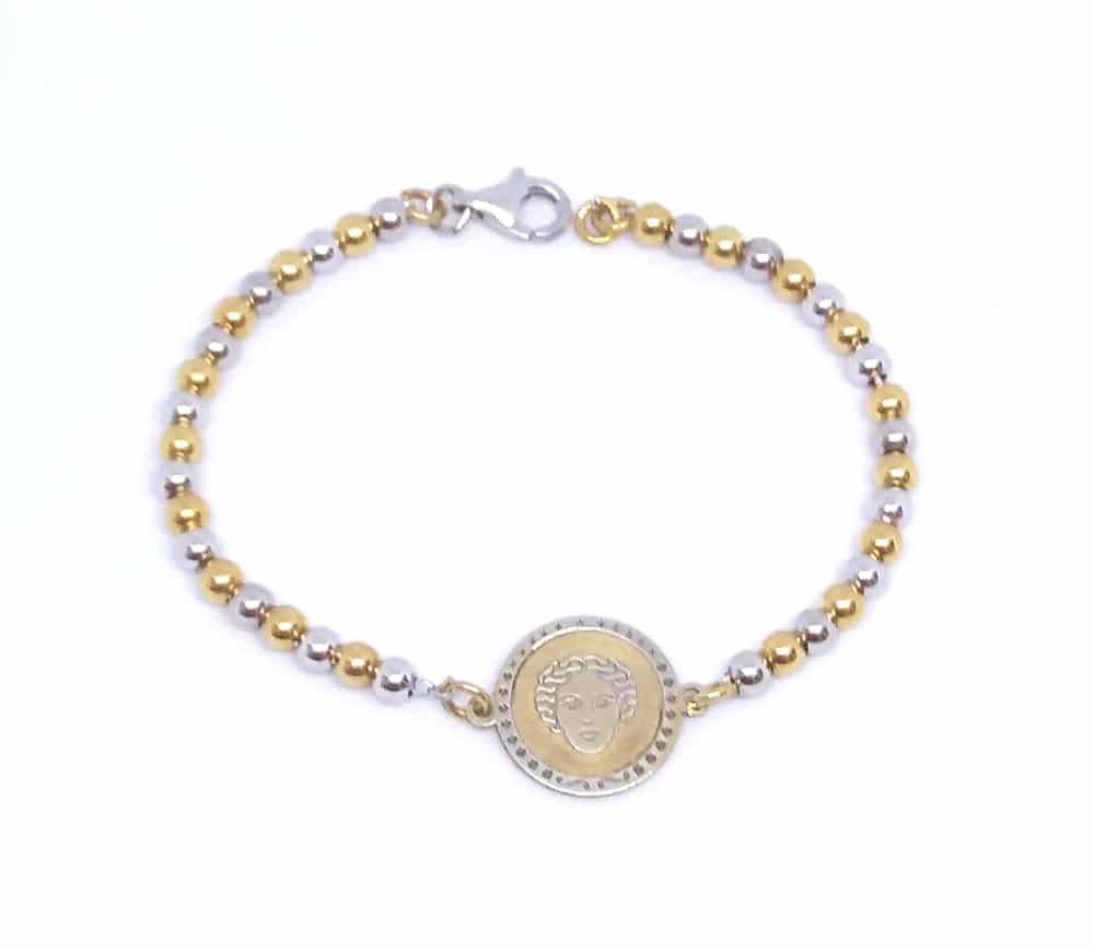 Bracciale Circe Bicolore in Argento con bassorilievo della Maga Circe e palline alternate in argento rodiato e dorato.